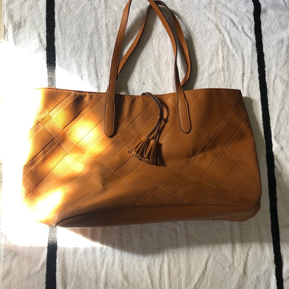 New, never used Ulta Beauty tote. Caramel color. Roomy.
